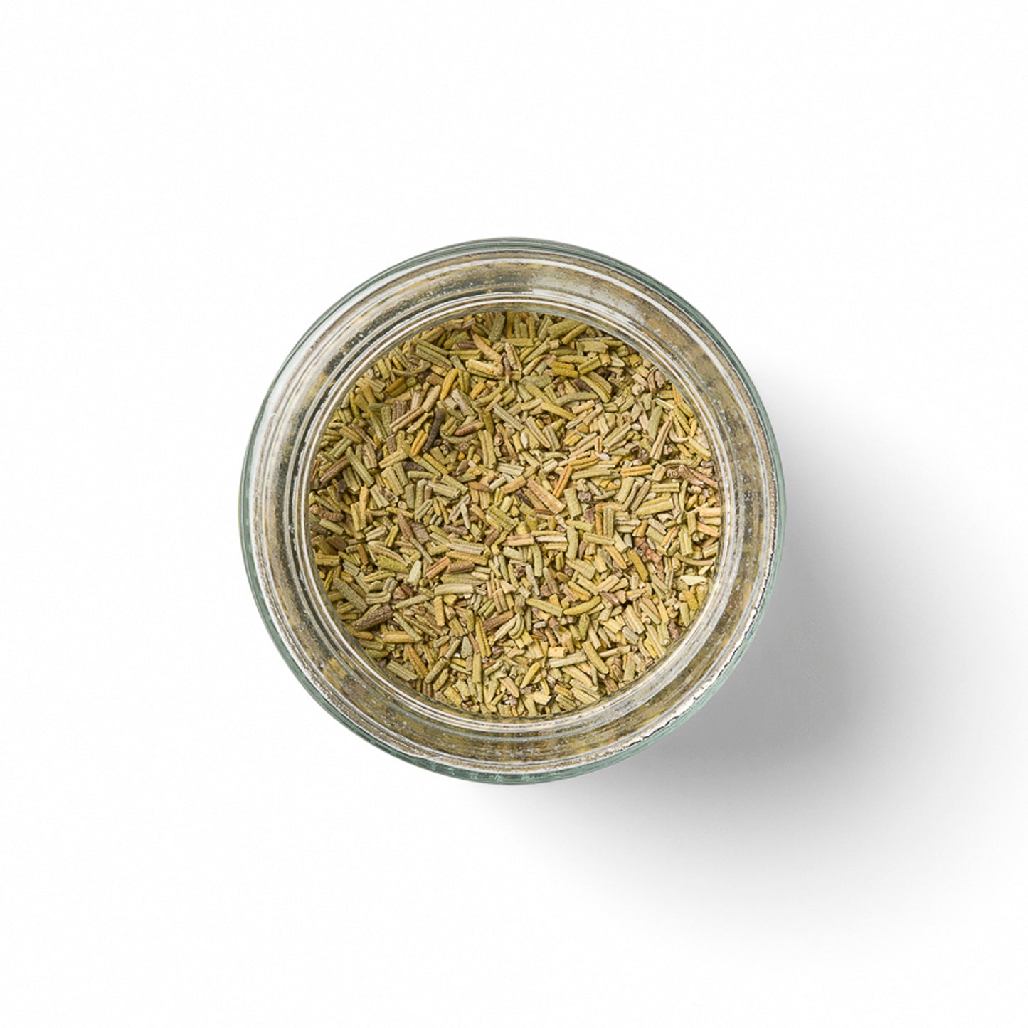 Open glass jar filled with dried organic rosemary on a white background - terreign